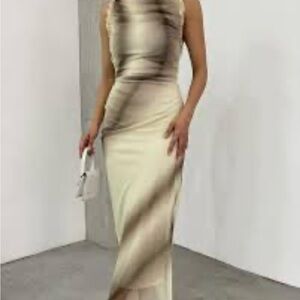 RUFFLED PRINTED TULLE DRESS
KHAKI 
XL. Tag attached. Never worn.